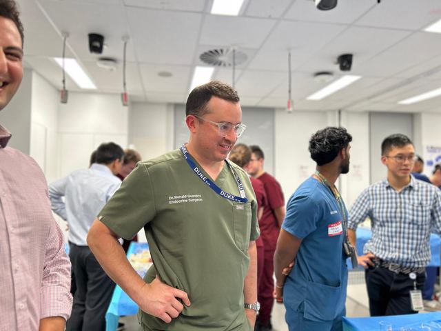 A surgeon teaching at the Surgical Skills Night